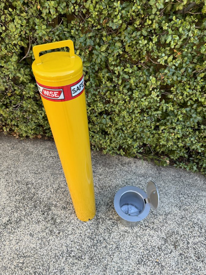 Removable safety bollard with sleeve